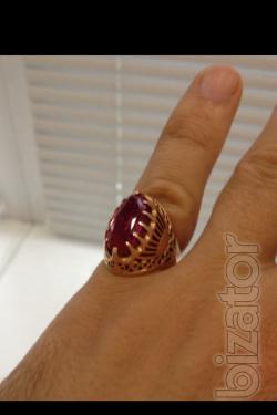 A gold ring with ruby made in the USSR. 