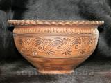 A clay bowl is handmade. "Dairy ceramics" 