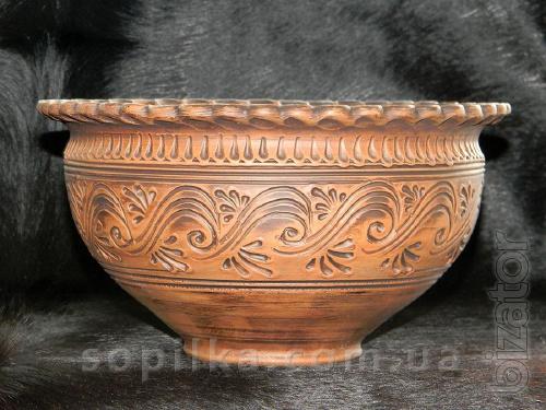 A clay bowl is handmade. "Dairy ceramics" 