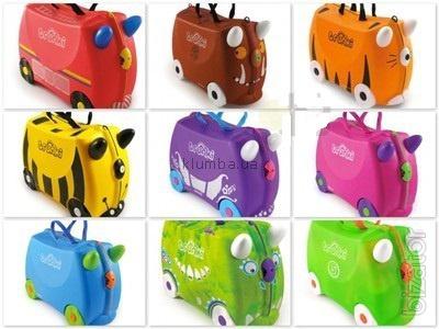 Baby briefcase British firm Trunki on wheels. Action 
