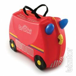 Baby briefcase British firm Trunki on wheels. Action 