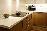Countertops, window sills, fireplaces, stairs made of stone.