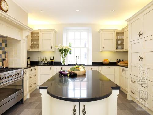 Countertops, window sills, fireplaces, stairs made of stone. 