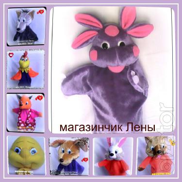 Doll - glove puppet theatre. Soft toy 