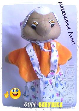 Doll - glove puppet theatre. Soft toy 
