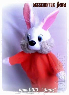 Doll - glove puppet theatre. Soft toy 
