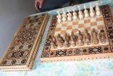 We offer backgammon, chess wood with carvings. 