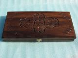 We offer backgammon, chess wood with carvings. 