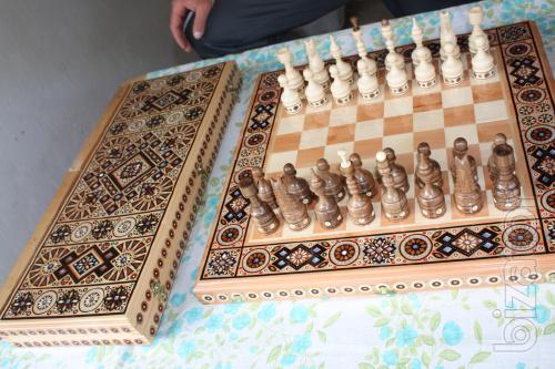 We offer backgammon, chess wood with carvings. 