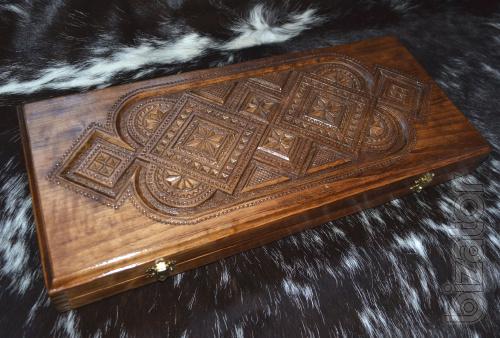We offer backgammon, chess wood with carvings. 