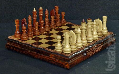 We offer backgammon, chess wood with carvings. 