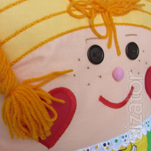 Textile doll-pillow 