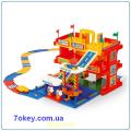 The garage has 3 floors with a road Wader. Toys Wader Wader