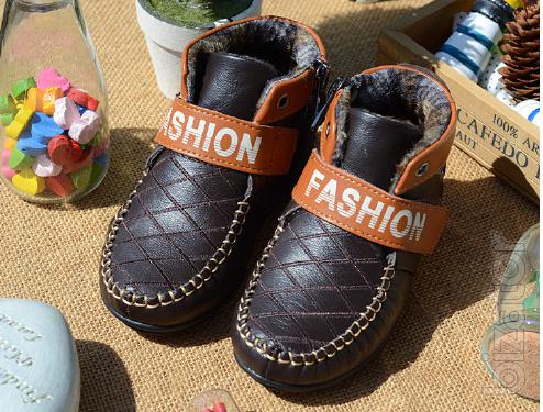 Stylish boots on the boy A 