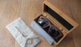Glasses in a wooden frame is a stylish and exclusive accessory 