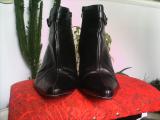 Ankle boots in black with decorative elements 
